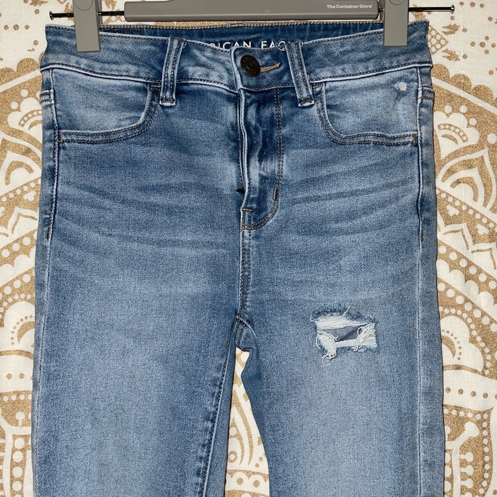 ✨HP✨ “AMERICAN EAGLE” NEXT LEVEL HI-RISE BLUE RIPPED JEGGING, LADIES SZ 2 SHORT - Picture 3 of 9